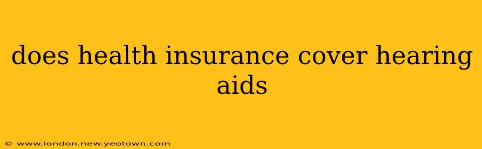 does health insurance cover hearing aids