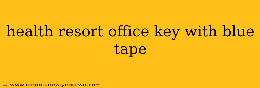 health resort office key with blue tape